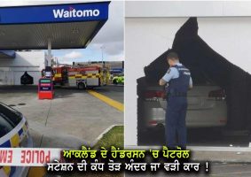 car smashes through petrol station wall